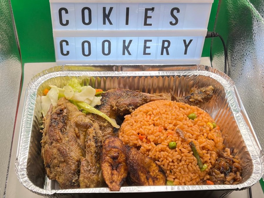 Cokie's jollof rice plate with grilled chicken